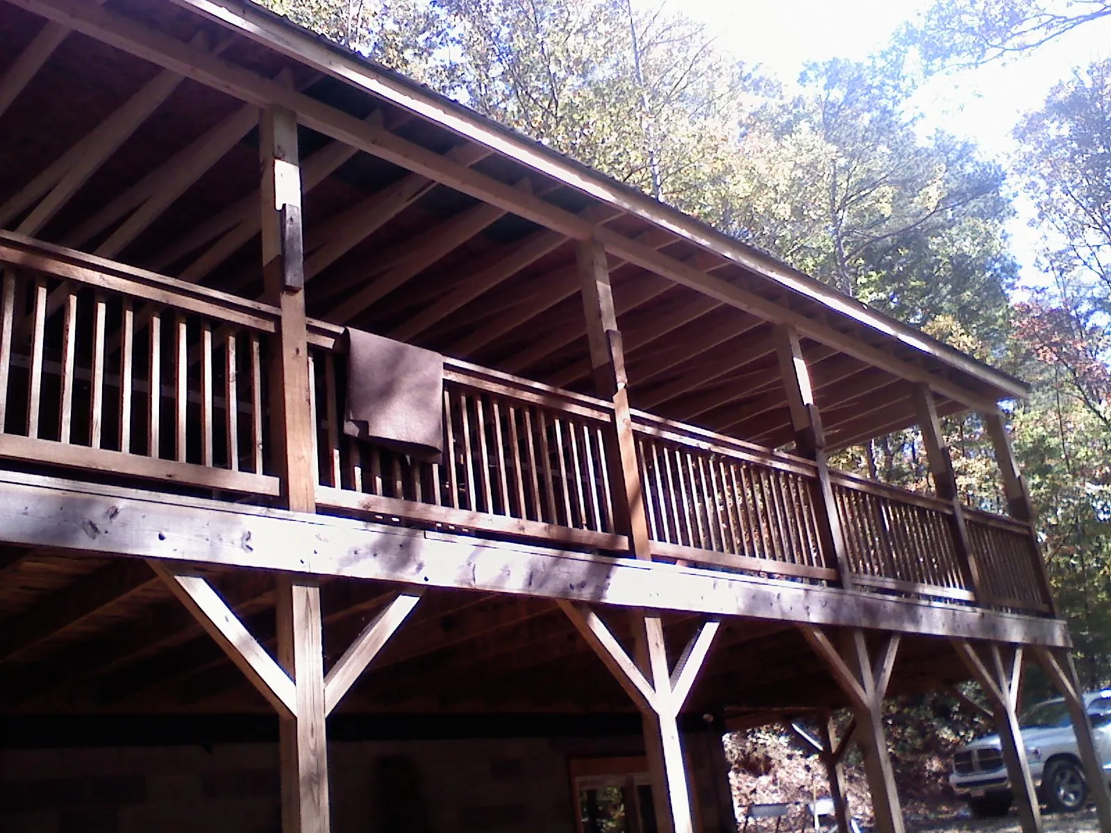 Timber framing under a new elevated porch and deck — Roof Leak Repair in Holmes by Roofing Brothers